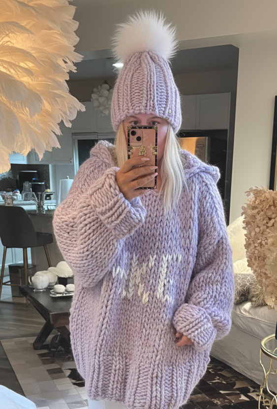 lilac hooded chunky hand knit sweater with lake lettering on a loose oversized soft luxurious wool sweater for women